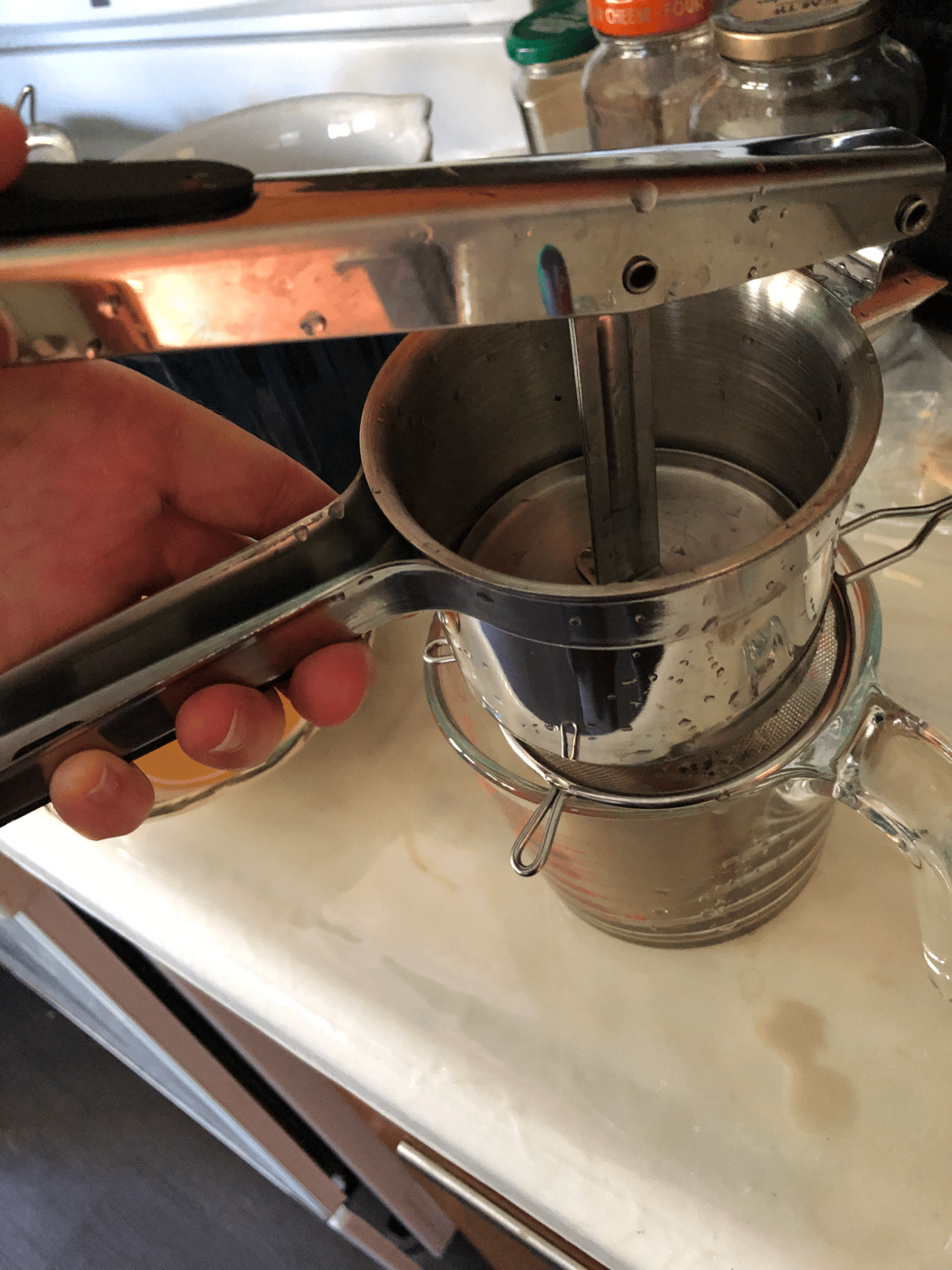 My potato ricer is really handy for squeezing all the goodness out of the herbs!